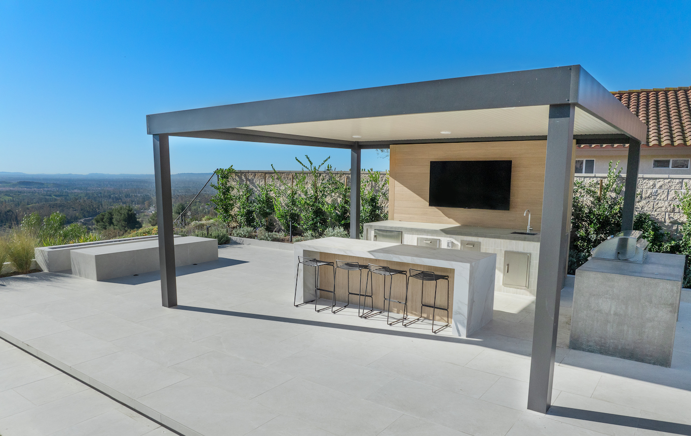 Equestrian Drive home renovation photo 9 — living room addition with recessed lighting