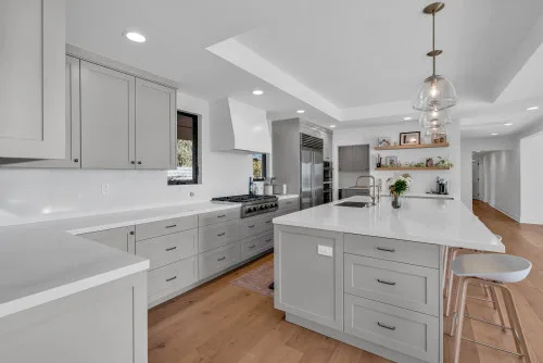 Custom Shaker Cabinetry With An Open Concept Layout Kitchen Remodel in Santa Ana, CA by Cutler Construction Services, Inc. project photo 2